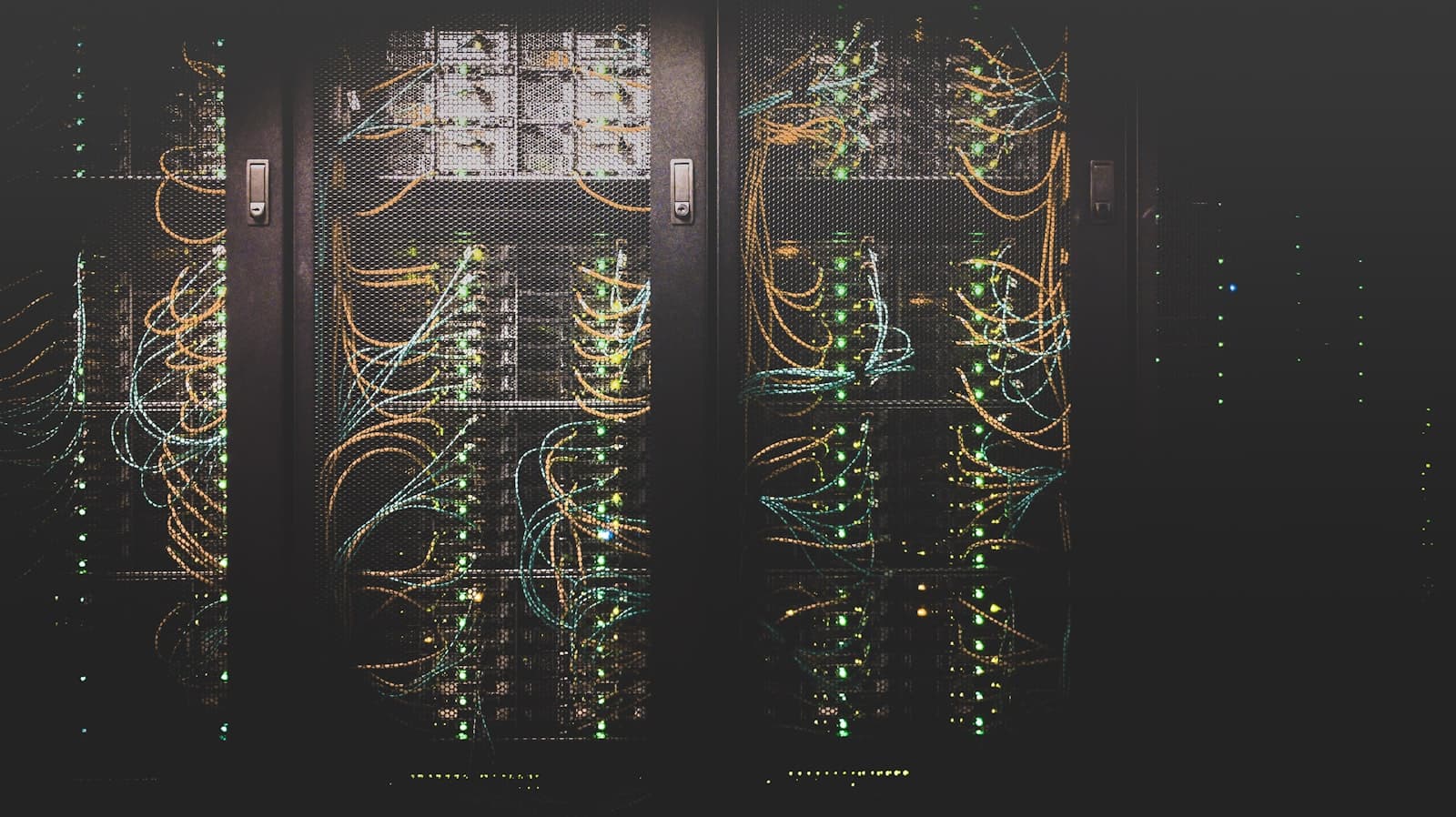 Racks of network equipment glowing in a data center